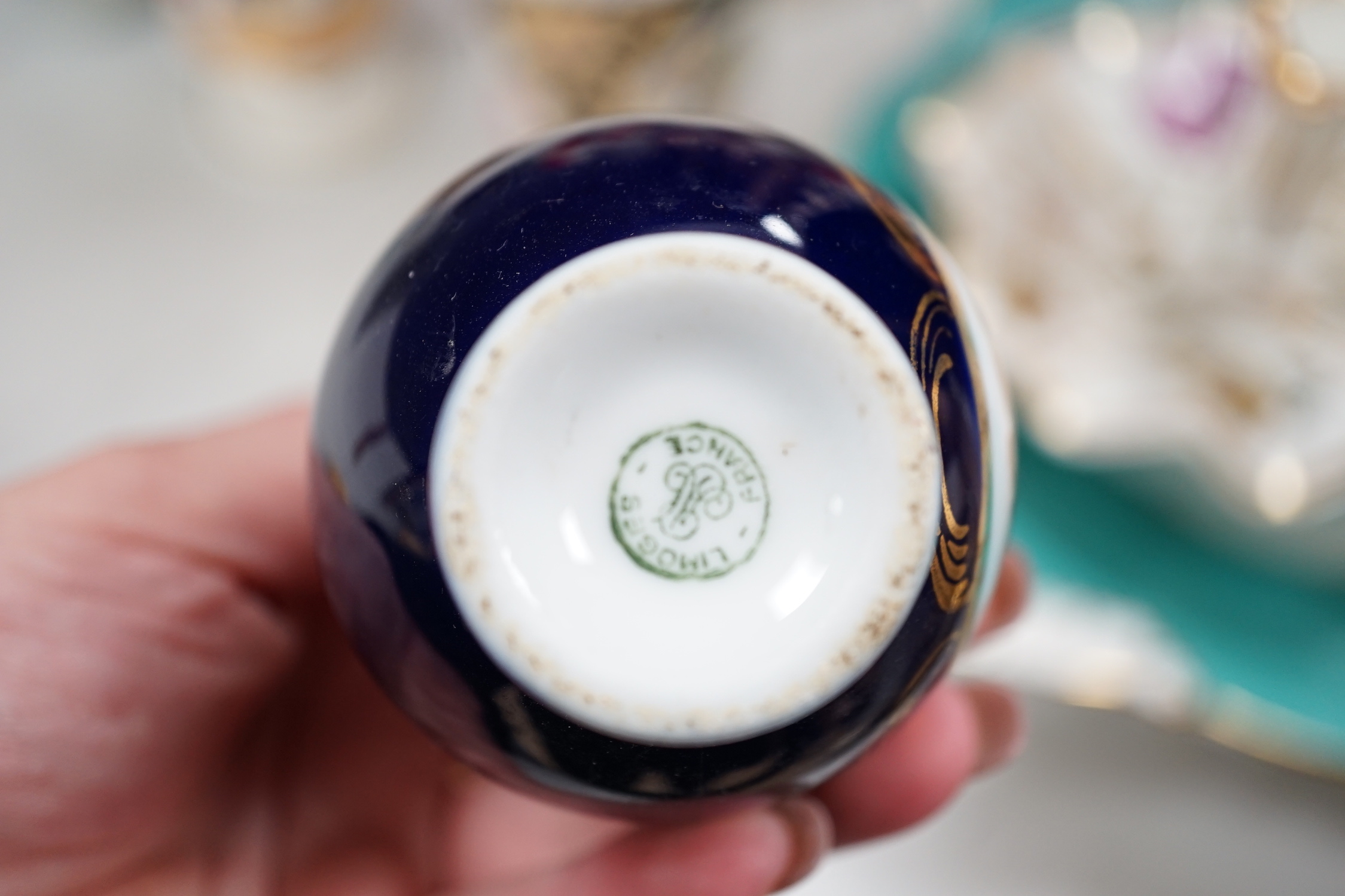 19th century and later porcelain and ceramics including Staffordshire comforter spaniels, Doulton Toby jugs, Coalport dish and Limoges enamel vase